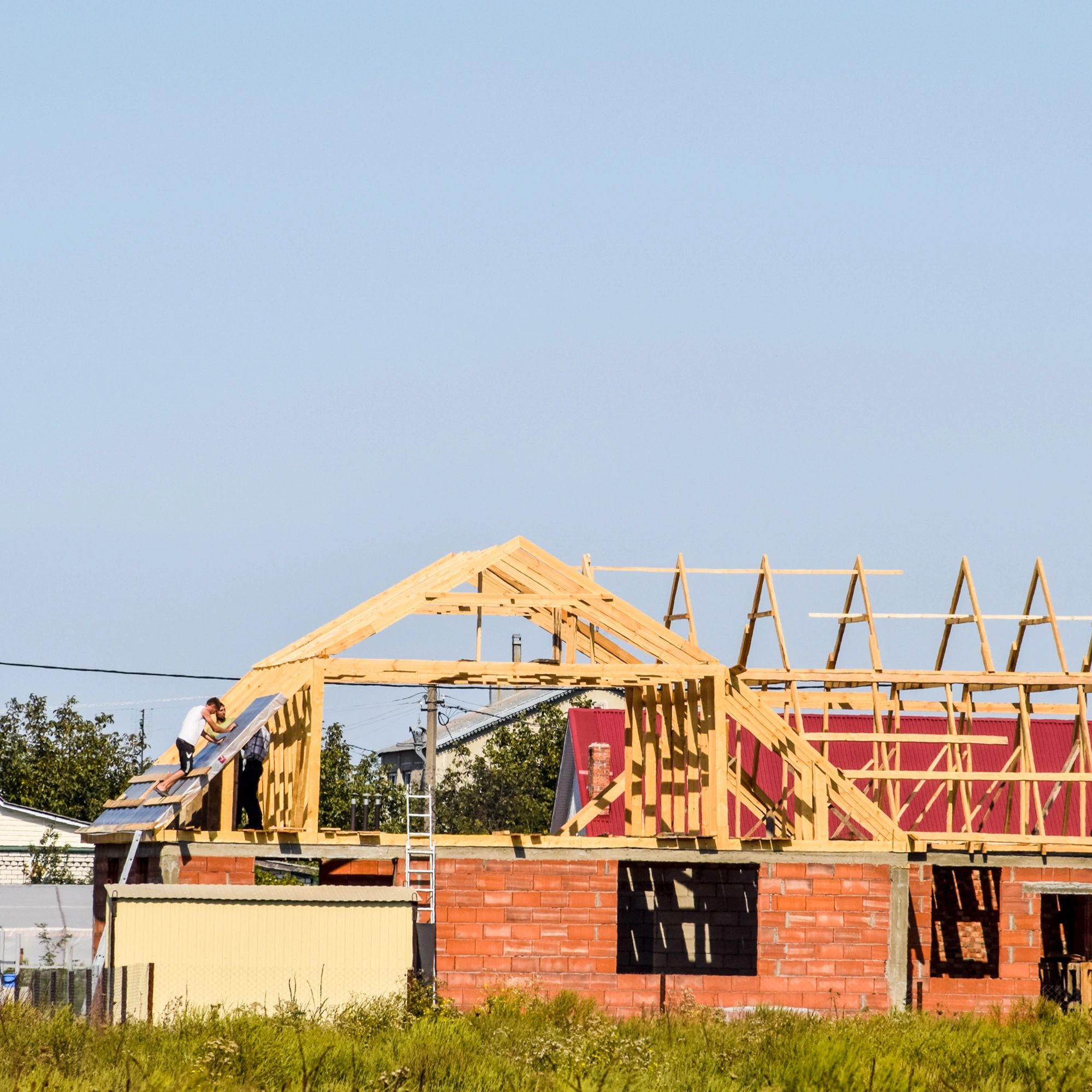 House under construction with roof framing